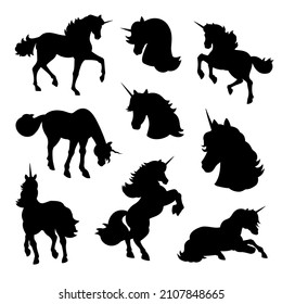 Vector unicorn silhouette. Unicorn silhouette isolated on white. Unicorn head, prancing unicorn, cutout clip art.