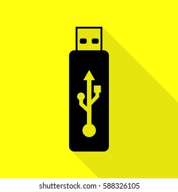 Vector USB flash drive sign. Black icon with flat style shadow path on yellow background.