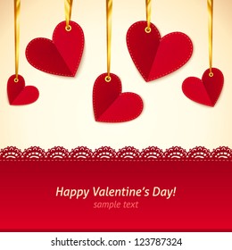 Vector Valentine's day greeting card with paper hearts on gold ribbons and lacy red background