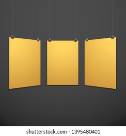 vector vertical gold empty poster set suspended on office clamps mock up realistic shadow blank template isolated black background