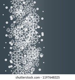 Vector of vertical seamless parttern with snowflakes.Border far greeting,invitation card or banner.New Year and Christmas design.
