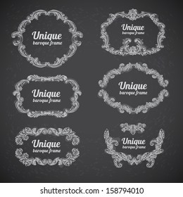 Vector vintage baroque engraving floral scroll filigree design on chalkboard