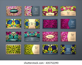 Vector vintage business cards big set. Floral mandala pattern and ornaments. Oriental design Layout. Islam, Arabic, Indian, ottoman motifs. Front page and back page.
