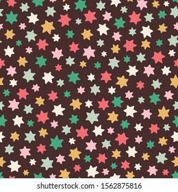 Vector vintage coloured star seamless pattern background. Sweet hand drawn tossed design.