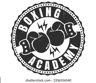 Vector vintage emblem for a boxing with two gloves. Retro sport logo for boxing academy