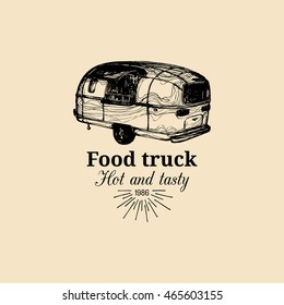 Vector vintage food truck logo with lettering. Retro hand drawn hipster street snack car illustration. Hot And Tasty eatery emblem.
