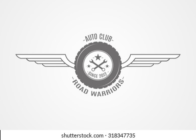 Vector vintage garage logo with tyre and wings