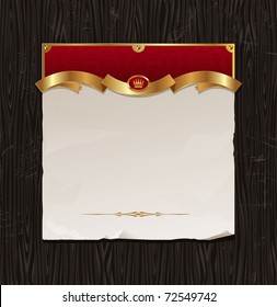 Vector vintage golden frame with paper banner on a black wood background