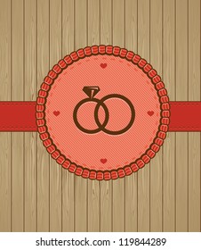 Vector vintage greeting card with wedding rings - background
