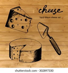Vector vintage hand-drawn cheese set on old wood background