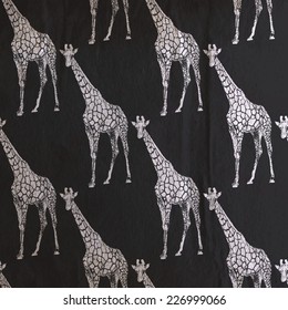 vector vintage illustration of giraffe pattern on the old black wrinkled paper background