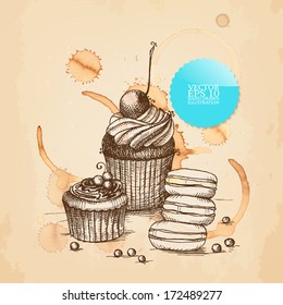 Vector vintage illustration with hand drawn cupcakes on background with natural coffee spots. 