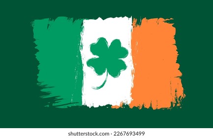 Vector vintage Ireland flag with lucky four leaf clover for Patrick's day. Vintage flag of Ireland with lucky four leaf clover in grunge style.