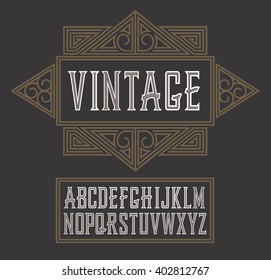Vector vintage label font.  Whiskey style. Font, good to use in any style labels of alcohol drinks. Business card, leaflet and other printing production. ABC. Alphabet with decoration