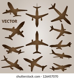 Vector vintage old set of brown planes drawings on a beige background. It is a group or collection of aircrafts ideal for grungy, travel, flight,transport,retro,antique,business or commercial designs