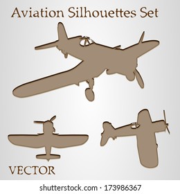 Vector vintage old set of brown planes drawings on a beige background. It is a group or collection of aircrafts ideal for grungy, travel, flight,transport, retro,antique,business or commercial designs