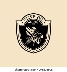 Vector vintage olive logo. Retro emblem with branch. Hand sketched natural oil production sign.