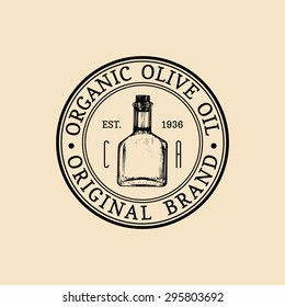 Vector vintage olive logo. Retro emblem with organic oil bottle. Hand sketched rural farm production sign.