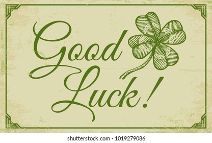 Vector vintage poster with clover for Patrick's day. Green lucky clover and text Good luck. 