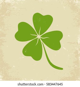 Vector vintage poster with clover for Patrick's day. Green clover on old paper