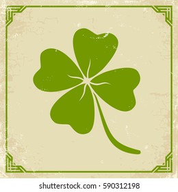 Vector vintage poster with clover for Patrick's day. Green clover on old paper.