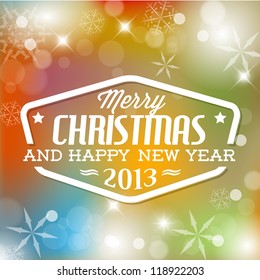 Vector vintage retro christmas label on blurred background