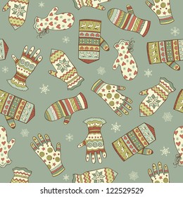 Vector vintage seamless pattern with sketching mittens and gloves on the winter background