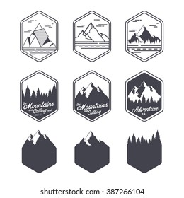 Vector vintage set of travel labels with mountains and blank badges