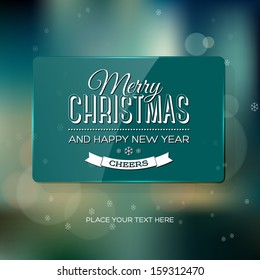 Vector vintage soft blurry teal christmas greeting card / poster with subtle bokeh and glossy banner. Cross process color effect. Retro look. Vintage film effect. Festive typography.