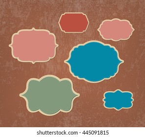 Vector vintage stitched layered fabric badges collection on weathered paper background.