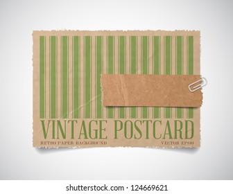 Vector vintage striped paper card template with a torn piece of old paper attached with a paper clip