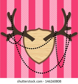 Vector vintage style antler with beads on pink striped background