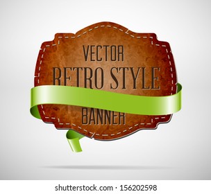 Vector vintage used worn leather die cut banner with green silky ribbon