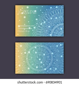 Vector vintage visiting card set. Glowing shiny floral mandala pattern and ornaments. Luxury design