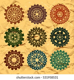 Vector vintage wheels set on a grunge paper background. Steampunk style.