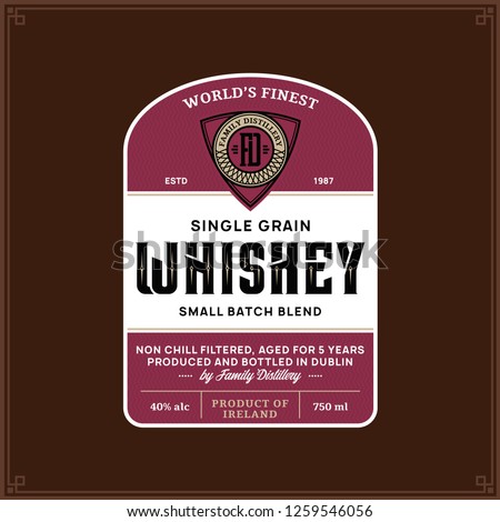Vector vintage whiskey label on a brown background. Distilling business branding and identity design elments.