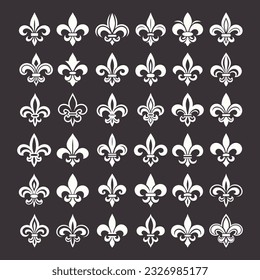 Vector Vintage White and Black Fleur De Lis Icon Set Isolated. Heraldic Lily, Retro Design Element. Vector Illustration