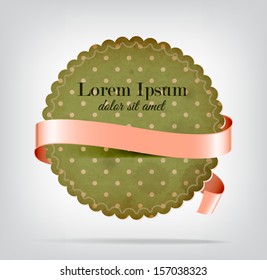 Vector vintage worn old paper round die cut badge / banner with green dotted pattern, with pale pink silky ribbon