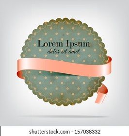 Vector vintage worn old paper round die cut badge / banner with blue dotted pattern, with pale pink silky ribbon