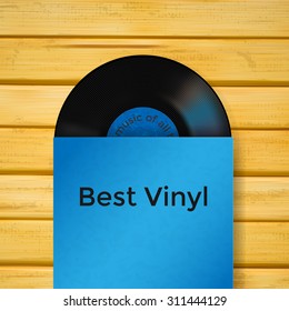 Vector vinyl record in cover on wooden background
