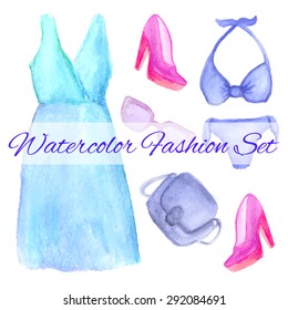 Vector watercolor fashion wardrobe objects set. Hand drawn watercolor beach travel  clothing and accessories: dress, hat, bag, swimsuit, sunglasses, shoes.