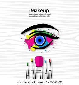 Vector watercolor hand drawn illustration of colorful women eye and makeup brushes.