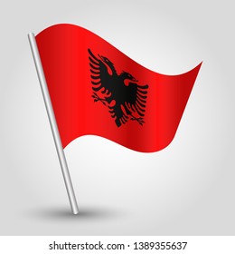 vector waving simple triangle albanian flag on slanted silver pole - symbol of albania with metal stick