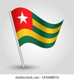 vector waving simple triangle togolese flag on slanted silver pole - symbol of togo with metal stick