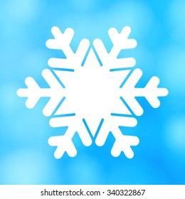 Vector white christmas snowflake on a blue background