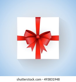 Vector white gift box with red ribbon and bow on gradient blue background. Top View. Design for Christmas, Valentine day, wedding, Birthday. Realistic mock up  design