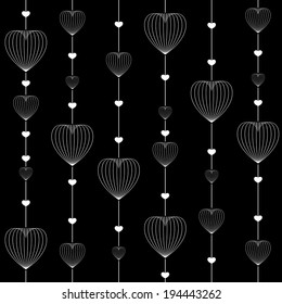 vector of white heart shaped designs on black background