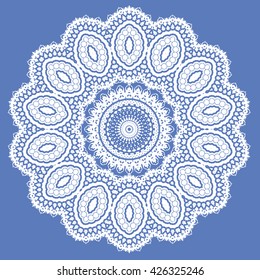 Vector White Mandala Isolated on Blue Background. Round Ornament