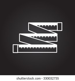 Vector white outline tailor ruler icon on black background 
