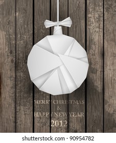 Vector White Paper Christmas Origami Ball On A Wood Background